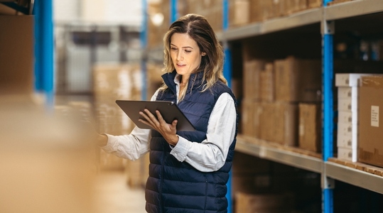 Female manager using a digital tablet to do inventory control