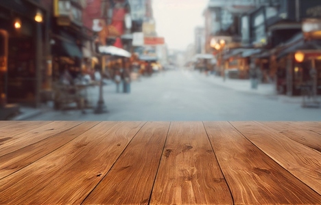 Empty wood table top on blur abstract of street restaurant outdo