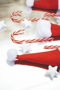 Reflected image of christmas classic decorations with candy cane
