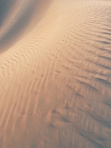 Dune in desert with natural patterns on sand