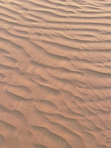 Natural pattern on a sand at sunset