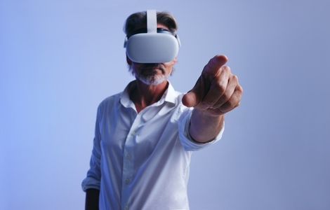 Businessman interacting with virtual space in a studio