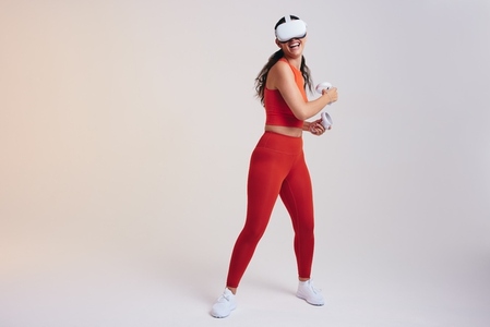 Woman enjoying her virtual reality workout