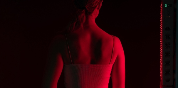 Woman getting red light therapy on her back