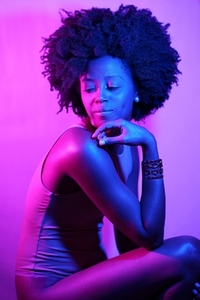 African American model under neon illumination