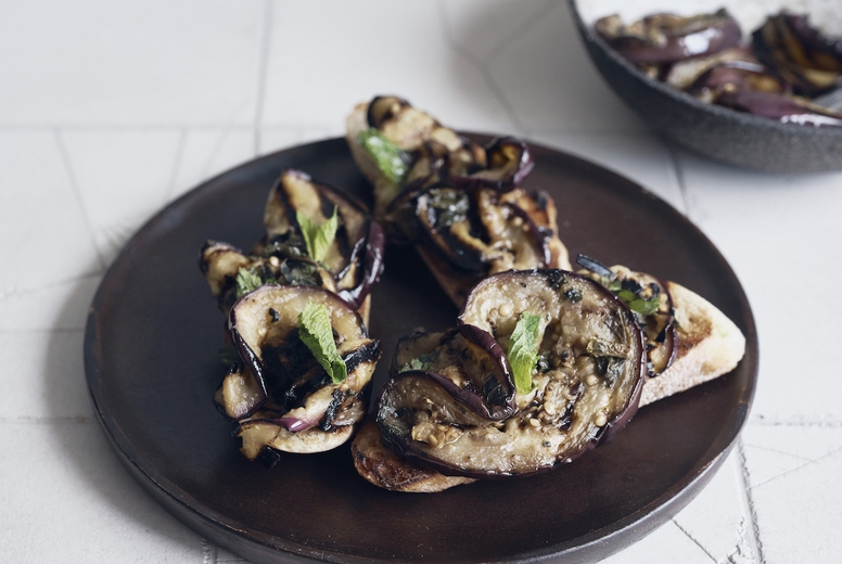 Grilled eggplant toast appetizer on plate