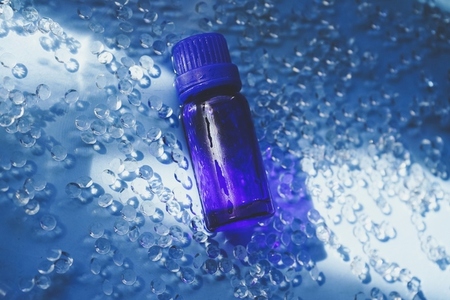 Blue bottle against blue water 2