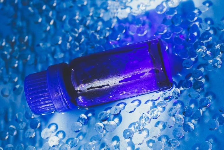 Blue bottle against blue water 3