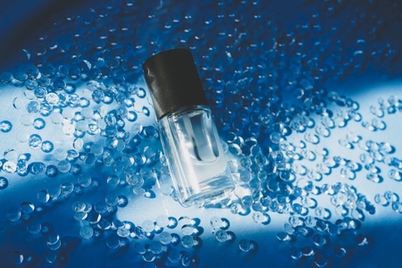 Still life image of a matte top coat bottle for manicure in elea