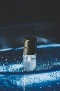 Still life image of a matte top coat bottle for manicure in elea