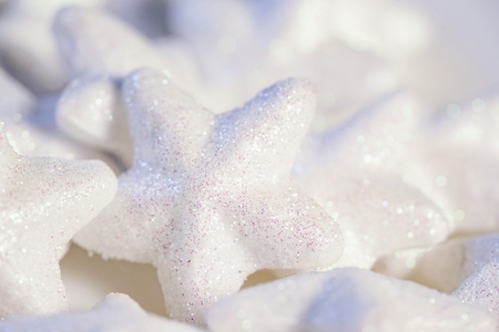 Many white stars covering with glitter for christmas decoration