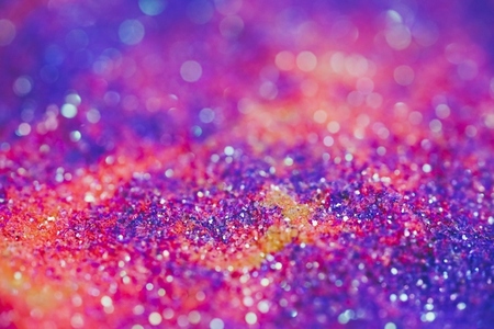 Real macro photography of colorful and shiny glitter