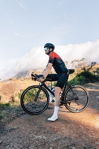 Male cyclist enjoying the view during his outdoor training