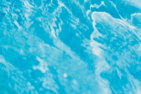 Summer image of water texture waves as background