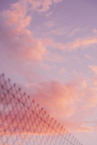 Background images of a kawaii anime style cloudy sky in pastel t