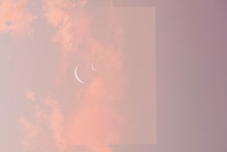 surreal and dreamy background of a pastel colors sky with moon