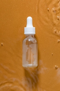 Glass bottle with serum or oil c