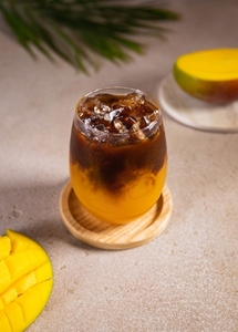Cold mango and coffee cocktail w