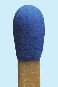 Close up blue matchstick on blue background