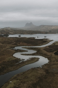 Winding river among remote landscape