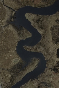 Aerial view winding river among landscape