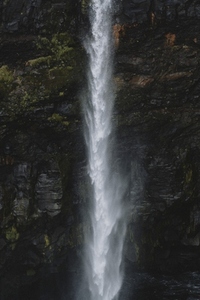 Waterfall flowing over cliff