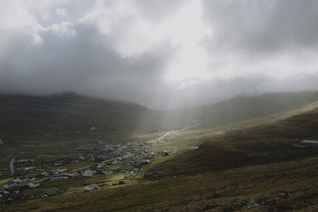 Sunlight over remote valley town