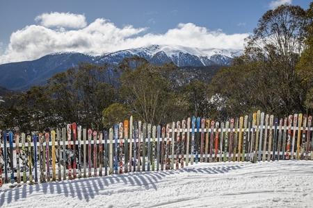 Ski fence in sunny idyllic winter mountains
