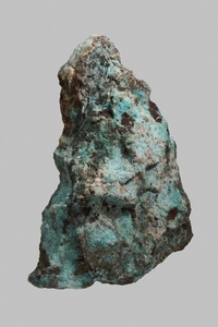 Close up textured German chrysocolla stone on gray background