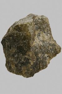 Close up detail textured Madagascan labradorite stone on gray background