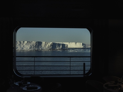 View of icebergs from ship window Antarctic Peninsula Weddell Sea Antarctica