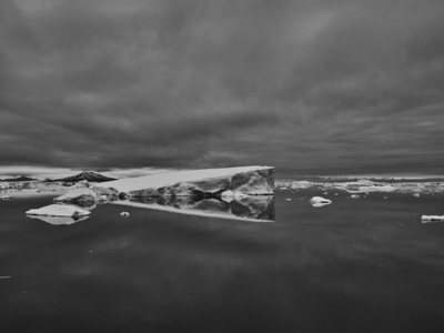 Iceberg formation under gray overcast sky Antarctic Peninsula Weddell Sea Antarctica
