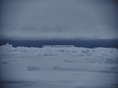 Mysterious blue iceberg in distance Antarctic Peninsula Weddell Sea Antarctica