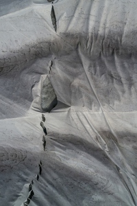 Aerial view protective tarpaulins over Rhone Glacier Switzerland