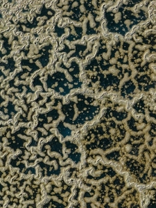 Aerial view salt pond forming abstract pattern Majorca Spain