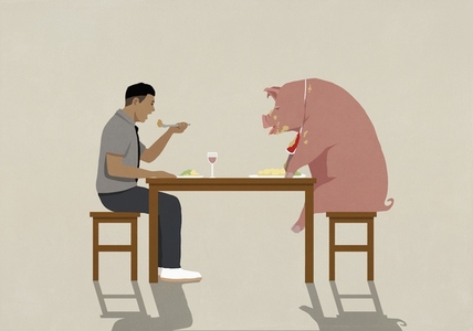 Man eating dinner with messy pig at dining table