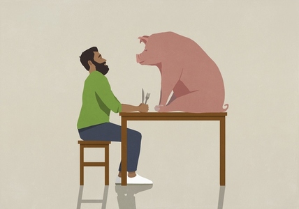 Man with fork and knife staring at pig on dining table