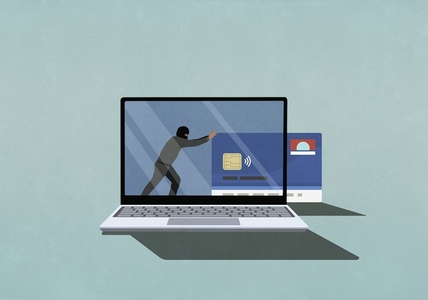 Computer hacker pushing credit card off laptop screen