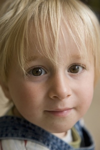 Close up of young blonde boy