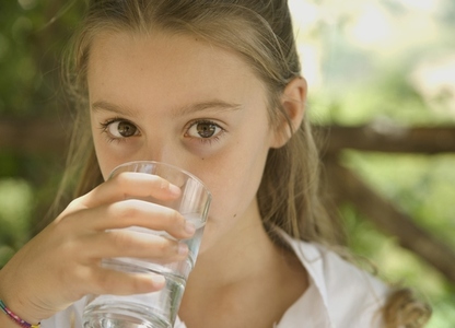 Young Girl Drinking Water