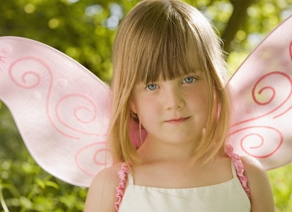 Close up of  girl in a pink fairy costume