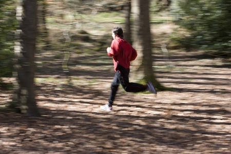 Portrait of a man running in the park