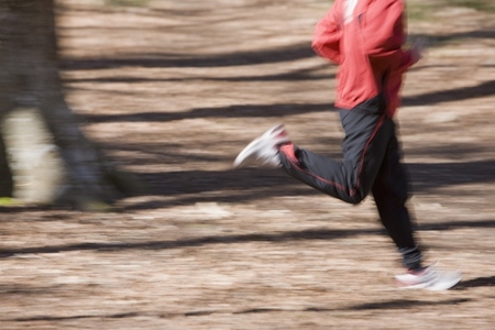 Portrait of man body running in the park