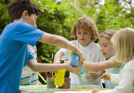 Children Painting in Garden