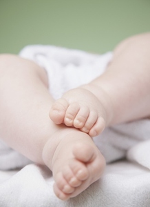 Close up of a baby feet and legs