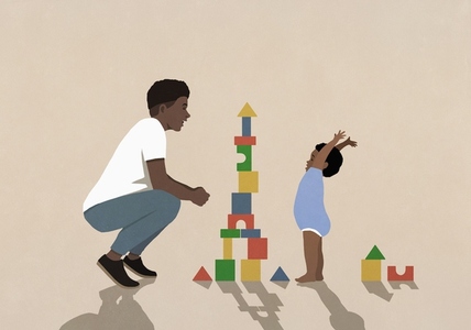 Father watching happy baby son playing stacking toy blocks