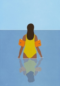Woman in bathing suit and water wings wading in ocean water