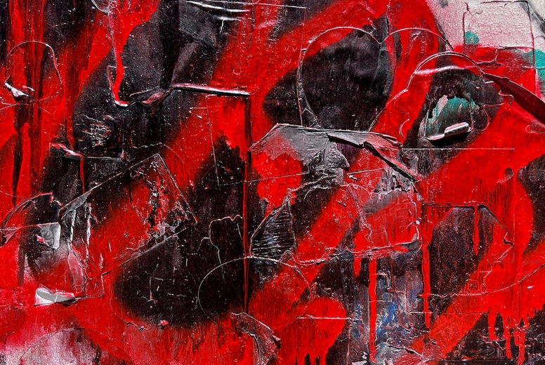 Layered red graffiti texture