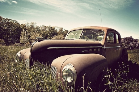 Rusty abandoned classic car
