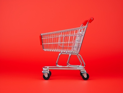 empty shopping cart on red